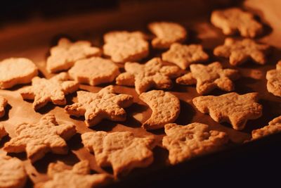 Close-up of cookies in baking sheet on table