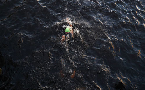 High angle view of woman on rock