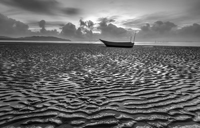 Boat in sea against sky