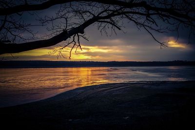 Scenic view of sea against sky at sunset