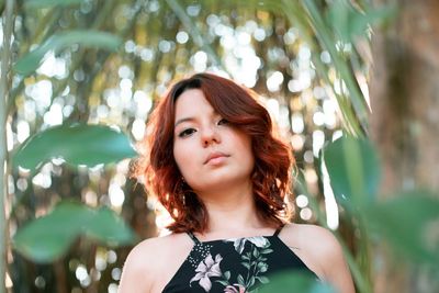 Portrait of young woman looking away