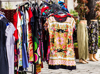 Clothes hanging in store for sale in market