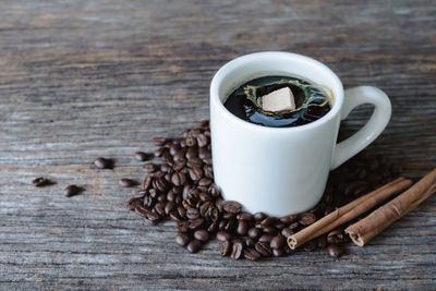 High angle view of coffee cup on table