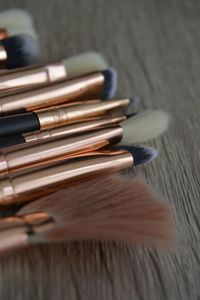 High angle view of paintbrushes on table