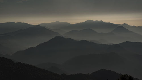 Scenic view of mountains against sky during sunset