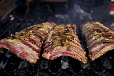 Close-up of meat on barbecue grill