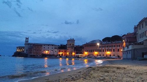 Illuminated buildings against the sky