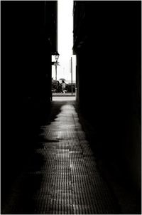 Narrow alley along buildings