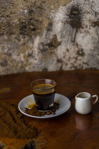 Coffee cup on table