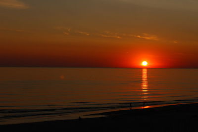 Scenic view of sea at sunset