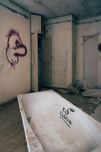 Graffiti on wall of abandoned building