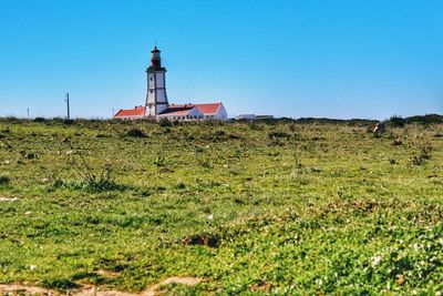 Low angle view of lighthouse against clear sky