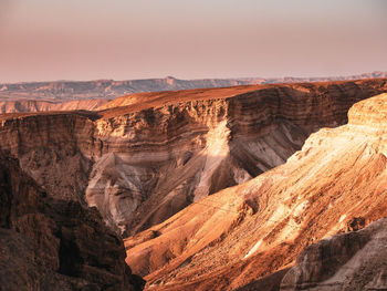 Aerial view of landscape with mountain range in background