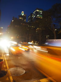 Light trails on city street at night