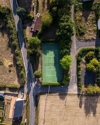 High angle view of empty sports court amidst trees