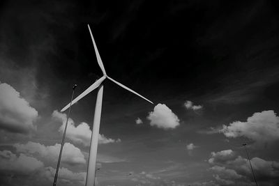 Traditional windmill against sky