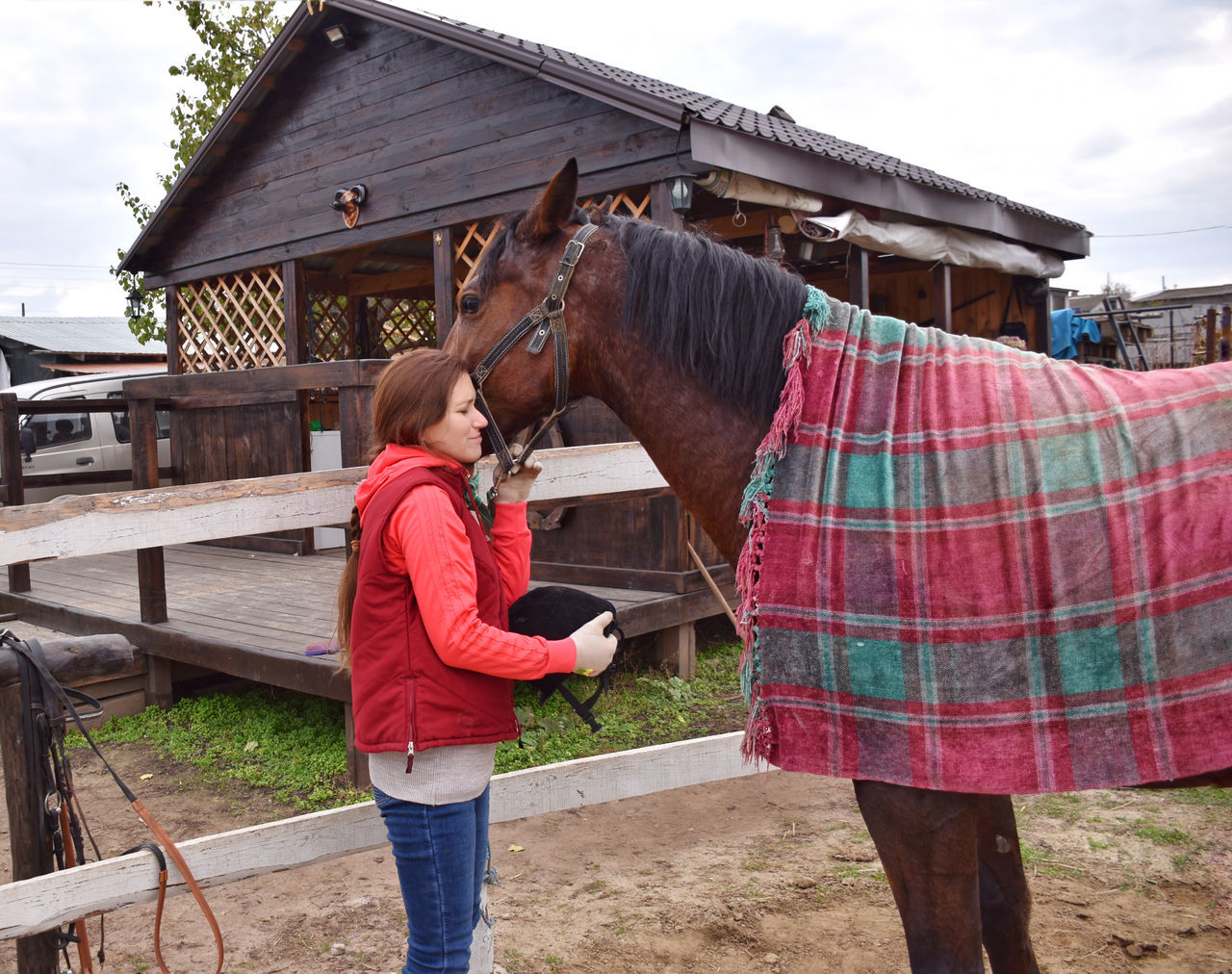 horse, adult, animal, animal themes, nature, women, domestic animals, farm, mammal, standing, livestock, rural scene, one person, clothing, female, agriculture, day, sky, architecture, landscape, lifestyles, animal wildlife, outdoors, casual clothing, leisure activity, childhood, pet, cloud, side view, child, built structure, men