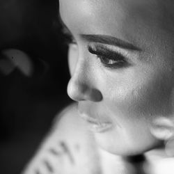 Close-up of thoughtful young woman looking away