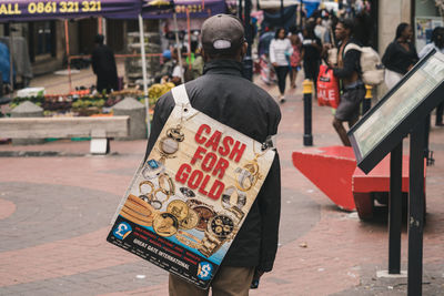 Rear view of man on street