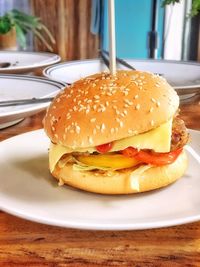 Close-up of burger in plate on table