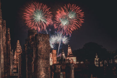 Firework display at night