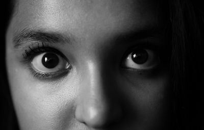 Close-up portrait of young woman