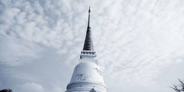 Low angle view of bell tower against sky