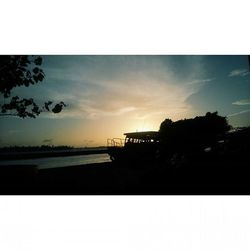 Scenic view of calm sea at sunset