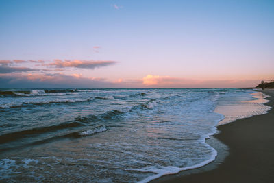 Scenic view of sea against sky during sunset