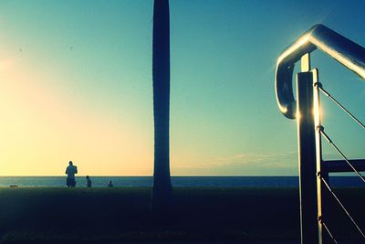 Scenic view of sea at sunset