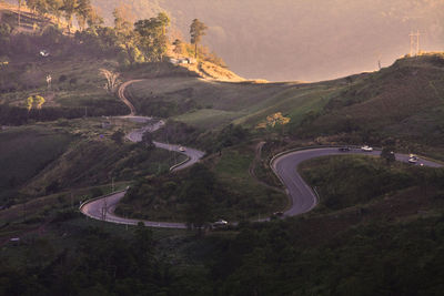 High angle view of road by mountain against sky