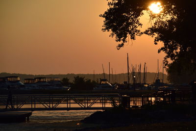 Silhouette of harbor at sunset