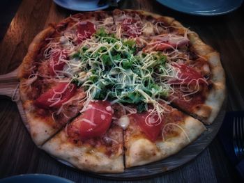 High angle view of pizza in plate on table