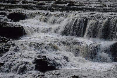 Scenic view of waterfall