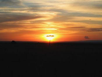 Silhouette of landscape against dramatic sky