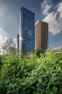 Low angle view of modern buildings against sky