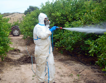 Man working by plants
