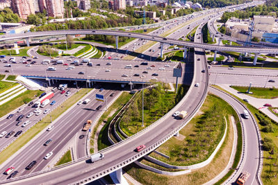 High angle view of vehicles on road in city