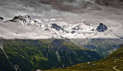 Scenic view of snowcapped mountains against sky