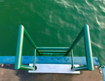 High angle view of ladder by lake