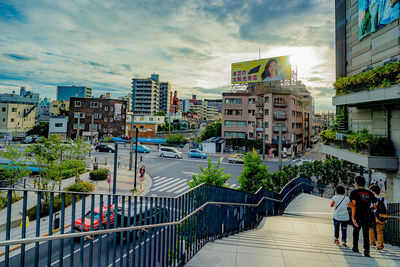 Buildings in city against sky
