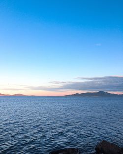 Scenic view of calm sea against sky