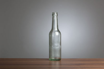 Close-up of bottle over white background