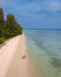 Scenic view of beach against sky