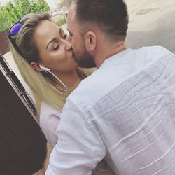 Young couple kissing outdoors