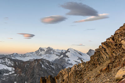 Sunrise view of the monte rosa group and strahlhorn, swiss alps, seen from weissmies, switzerland.