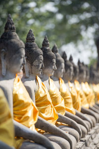 Buddha statues in row at wat yai chai mongkhon