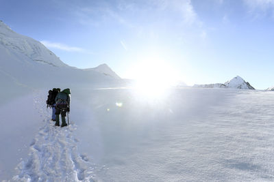 Scenic view of snow covered mountain against sky