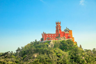 Historic building against clear blue sky