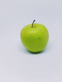 Close-up of apple against white background